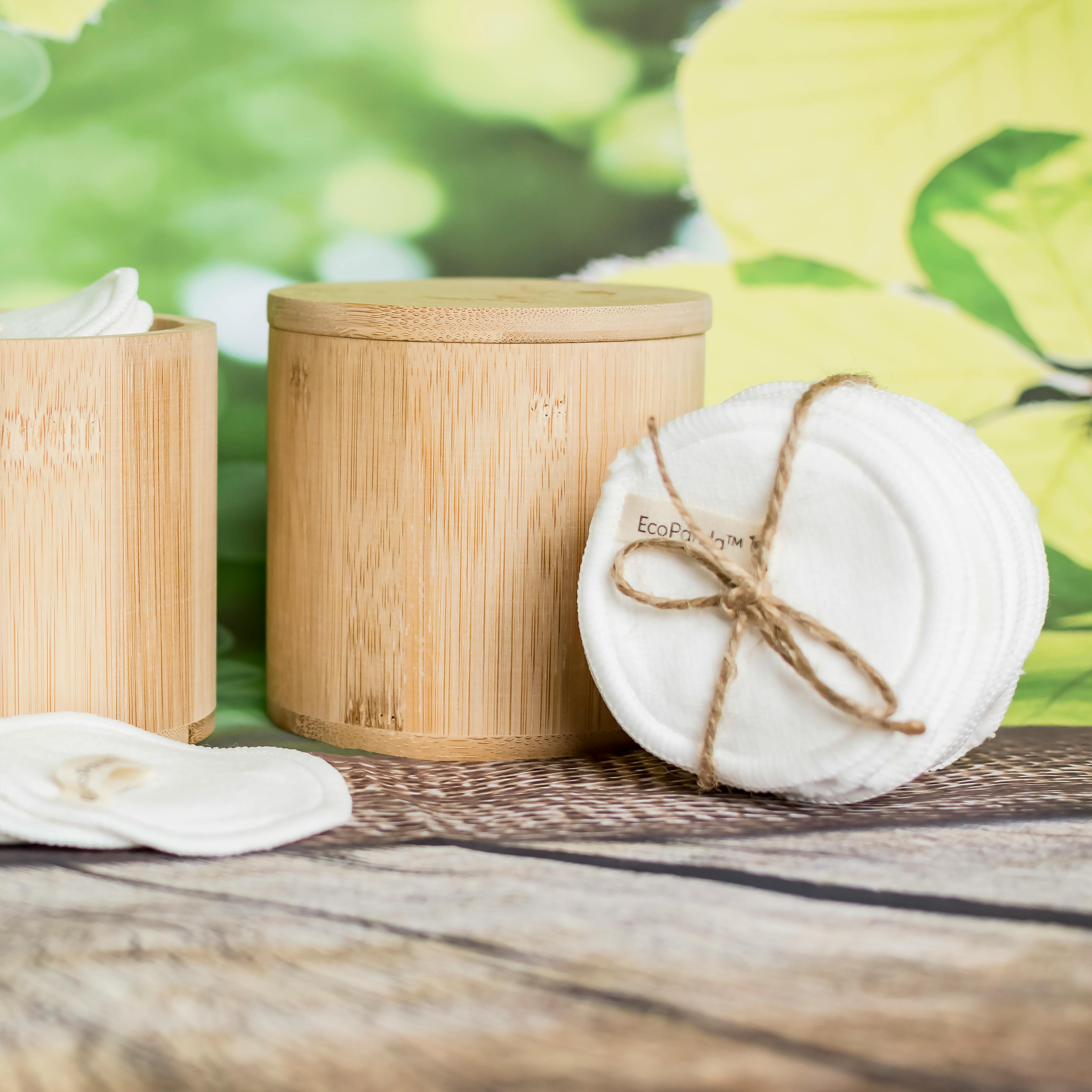 Eco-friendly reusable bamboo makeup remover pads with storage container, perfect for sustainable beauty routines