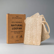 Natural Loofah Pad 2-Pack with 2x beige loofahs in frame with brown eco packaging in white backdrop