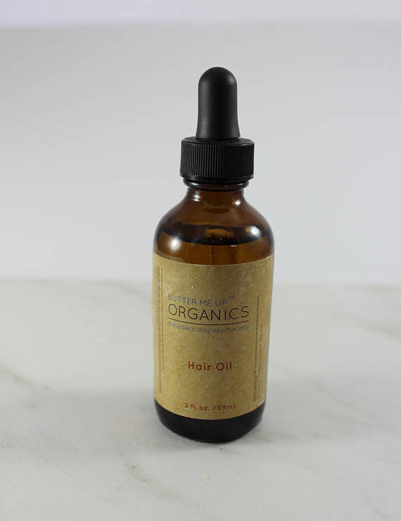 close up full rectangular shot style of product Organic Hair Oil for Healthy, Shiny Hair