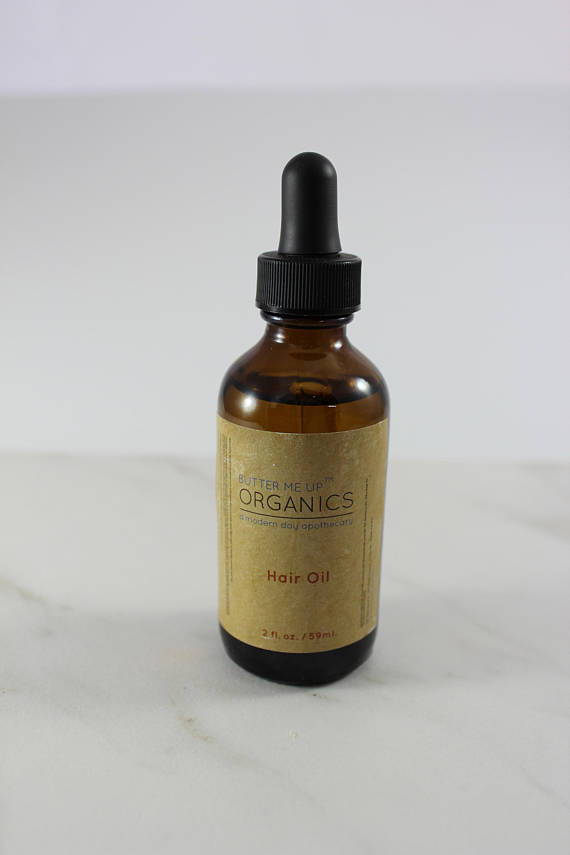 close up full rectangular shot style of product Organic Hair Oil for Healthy, Shiny Hair